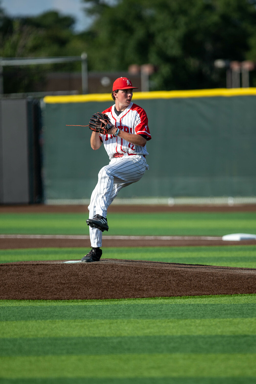 Lucas Moore pitches during Thursday's Regional Semifinal between Katy and Clear Springs at Langham Creek.